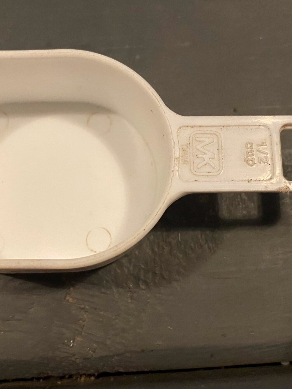 White 1/2 cup measuring cup